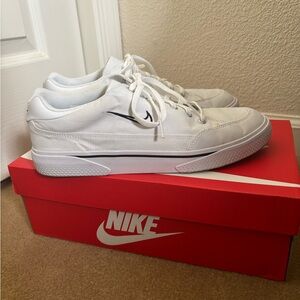 White Nikes, women’s size 10